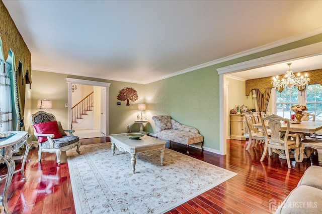 10 Dellview Dr, Edison, NJ 08820 - living room featuring a chandelier, stairs, wood finished floors, and crown molding