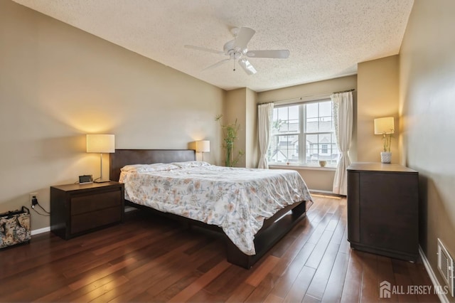 349 Lunar Rd, Piscataway, NJ 08854 - bedroom with a textured ceiling, wood finished floors, and a ceiling fan