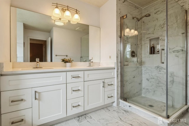 349 Lunar Rd, Piscataway, NJ 08854 - full bathroom featuring a marble finish shower, double vanity, and marble look tiles