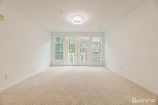 1109 Cedar Village Blvd, East Brunswick, NJ 08816 - carpeted empty room with baseboards