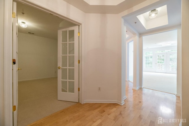 1109 Cedar Village Blvd, East Brunswick, NJ 08816 - corridor with light wood-style flooring and baseboards