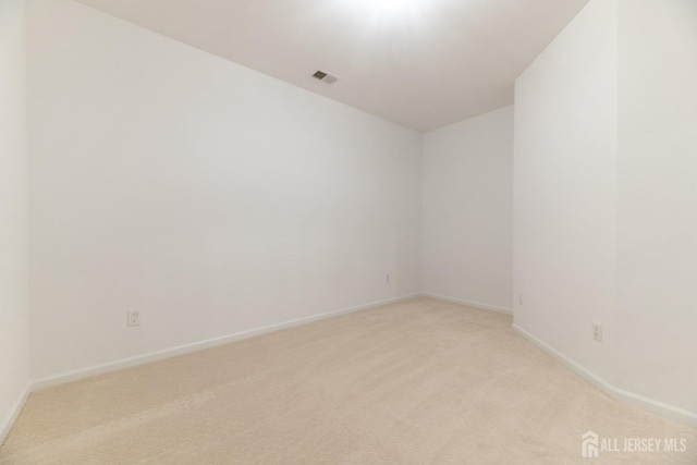 1109 Cedar Village Blvd, East Brunswick, NJ 08816 - empty room featuring light carpet and baseboards