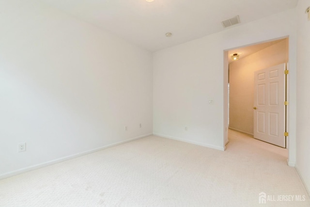 1109 Cedar Village Blvd, East Brunswick, NJ 08816 - spare room with light colored carpet and baseboards