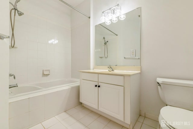 1109 Cedar Village Blvd, East Brunswick, NJ 08816 - bathroom featuring tile patterned flooring, toilet, tiled shower / bath combo, and vanity