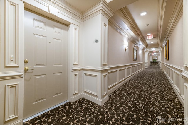 1109 Cedar Village Blvd, East Brunswick, NJ 08816 - corridor featuring crown molding, a decorative wall, carpet flooring, wainscoting, and recessed lighting