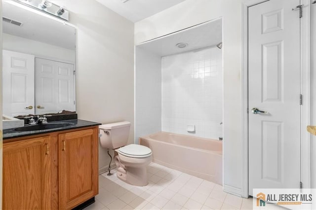 full bath featuring toilet, visible vents, baseboards, tile patterned flooring, and vanity