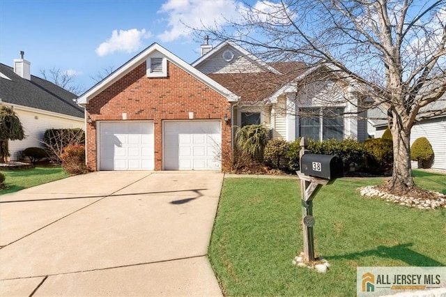 view of front of home with driveway, brick siding, a front lawn, and a garage