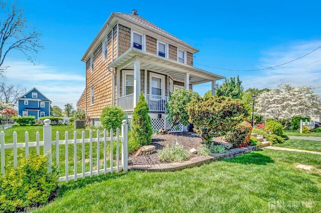 112 Adeline Ave, South Plainfield, NJ 07080 - view of front of home with a porch