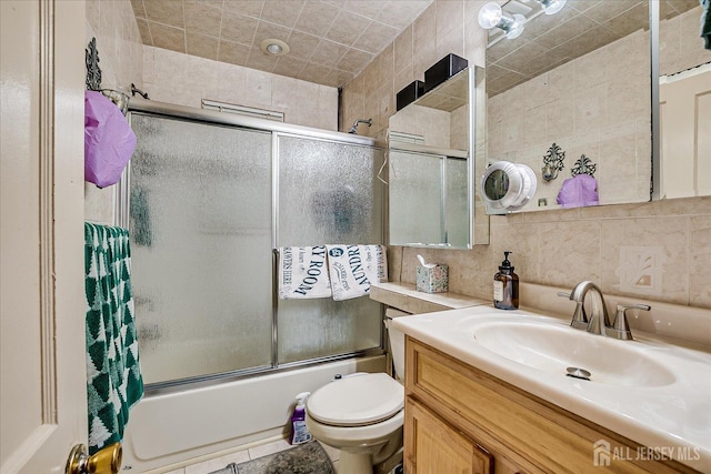 12 Church St, Sayreville, NJ 08872 - bathroom with vanity, combined bath / shower with glass door, and tasteful backsplash