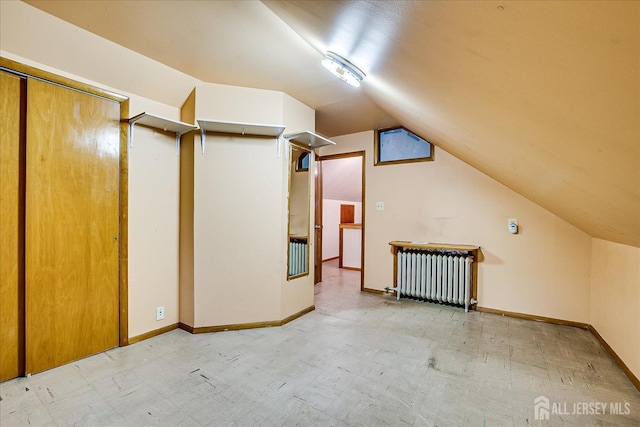 12 Church St, Sayreville, NJ 08872 - additional living space featuring radiator, lofted ceiling, and light floors