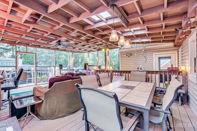 12 Church St, Sayreville, NJ 08872 - sunroom / solarium featuring outdoor dining area, a ceiling fan, beam ceiling, and healthy amount of natural light
