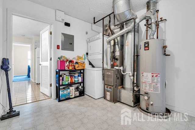 84 Prestwick Way, Edison, NJ 08820 - utility room featuring estacked washer and dryer, electric panel, and gas water heater