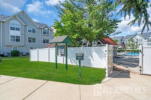 84 Prestwick Way, Edison, NJ 08820 - view of community featuring a swimming pool and a residential view