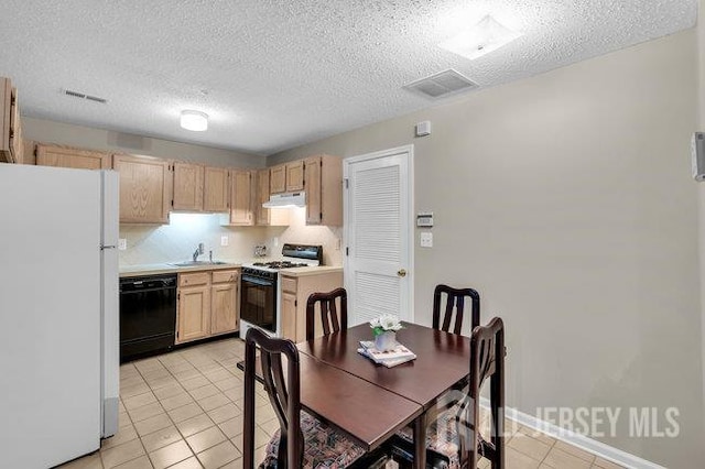 84 Prestwick Way, Edison, NJ 08820 - kitchen with freestanding refrigerator, gas stove, dishwasher, a sink, and under cabinet range hood