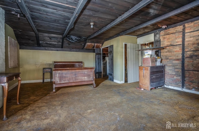 basement featuring wooden ceiling