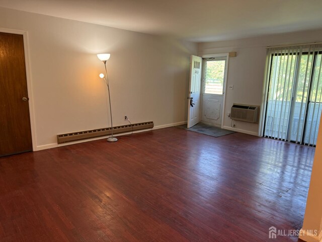 3013 Cromwell Ct, Hillsborough, NJ 08844 - unfurnished living room featuring a baseboard radiator, a wall mounted AC, wood finished floors, and baseboards