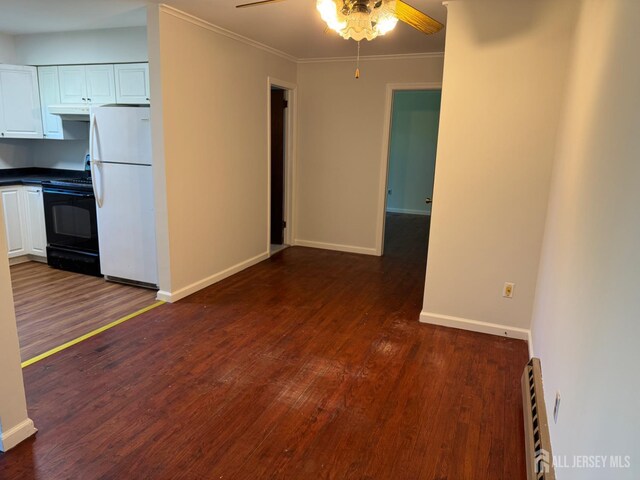 3013 Cromwell Ct, Hillsborough, NJ 08844 - unfurnished living room with a ceiling fan, dark wood-style floors, baseboards, and crown molding