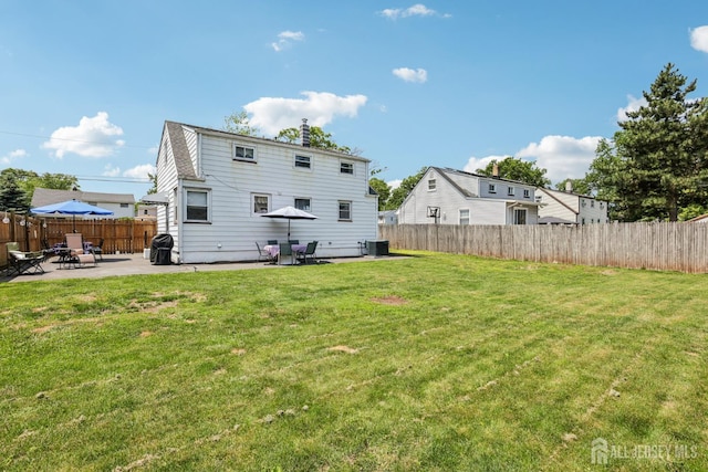 30 Clark Pl, Avenel, NJ 07001 - back of property featuring a patio area and a fenced backyard