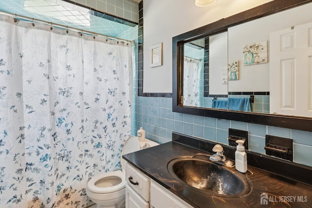 30 Clark Pl, Avenel, NJ 07001 - bathroom featuring tile walls, vanity, curtained shower, and backsplash