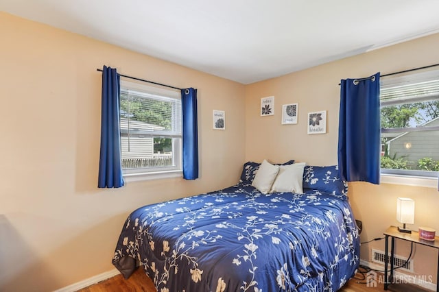 30 Clark Pl, Avenel, NJ 07001 - bedroom featuring multiple windows and wood finished floors
