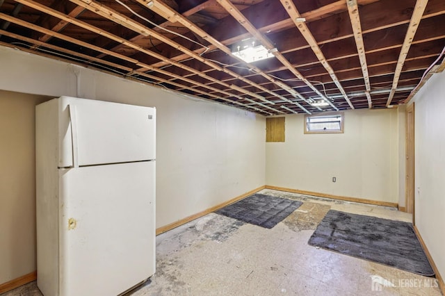 30 Clark Pl, Avenel, NJ 07001 - below grade area with freestanding refrigerator and baseboards