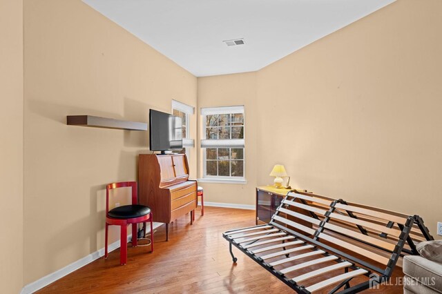 living area with wood-type flooring