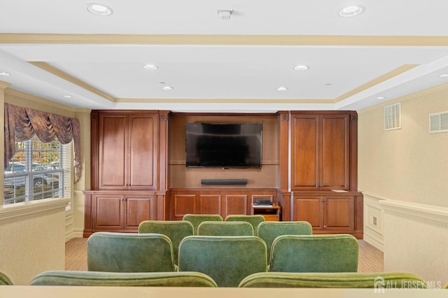 540 Cranbury Rd Unit 107, East Brunswick, NJ 08816 - home theater room featuring crown molding, a tray ceiling, wainscoting, recessed lighting, and a decorative wall