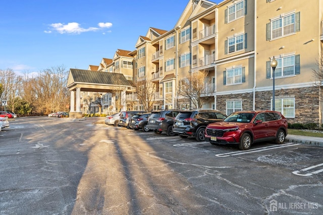 540 Cranbury Rd Unit 107, East Brunswick, NJ 08816 - view of building exterior with uncovered parking