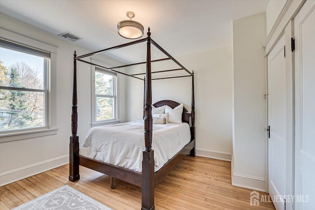 bedroom featuring light wood-type flooring