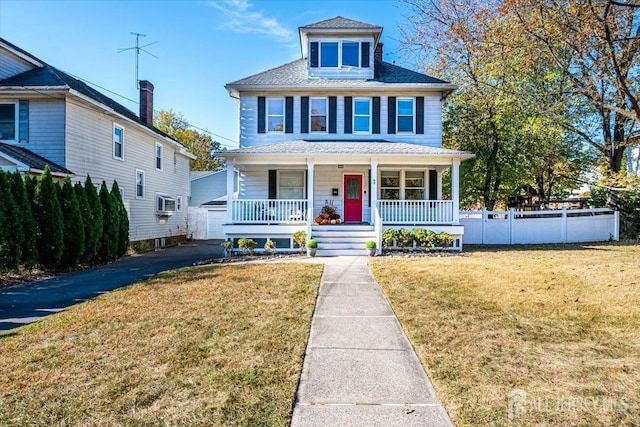 view of front of home featuring a porch and a front lawn