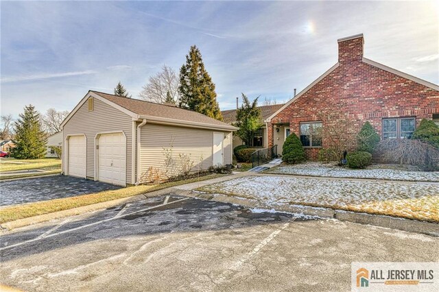 exterior space with a garage