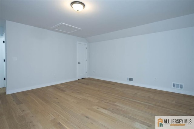 unfurnished room featuring light wood-type flooring