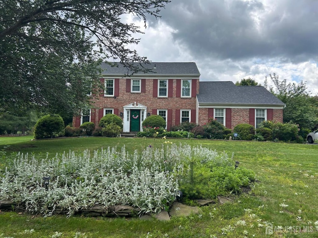 17 Springhill Dr, West Windsor, NJ 08550 - colonial inspired home with brick siding and a front yard