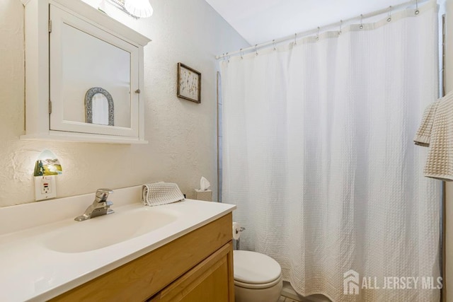 38 Foothills Dr, South River, NJ 08882 - full bath with vanity, toilet, and a textured wall