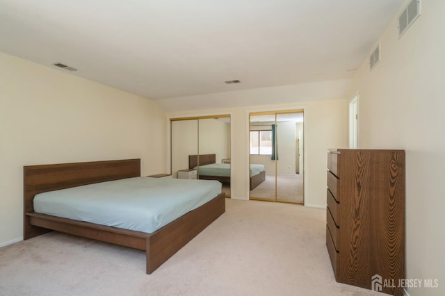 172 Sayre Dr, Plainsboro, NJ 08540 - bedroom featuring two closets, light carpet, and baseboards