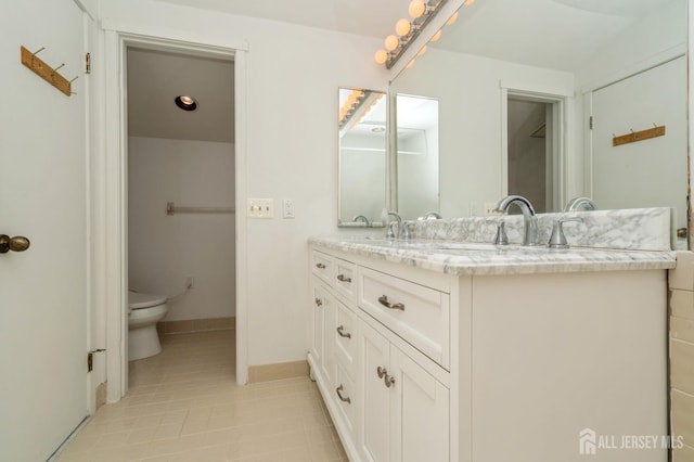 172 Sayre Dr, Plainsboro, NJ 08540 - full bath with vanity, toilet, tile patterned flooring, and baseboards