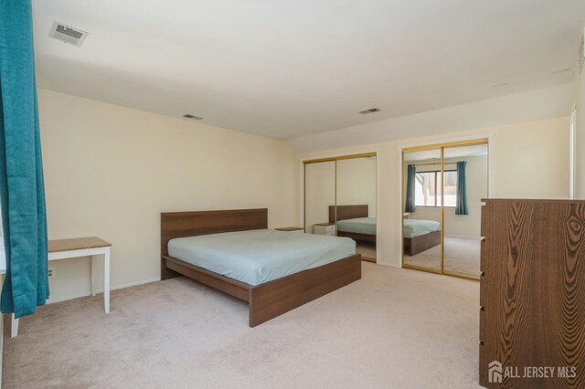 172 Sayre Dr, Plainsboro, NJ 08540 - carpeted bedroom with two closets