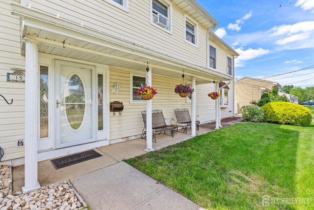 15 Creighton Cir, Old Bridge, NJ 08857 - doorway to property with a yard