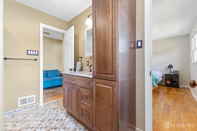 15 Creighton Cir, Old Bridge, NJ 08857 - ensuite bathroom featuring vanity and wood finished floors