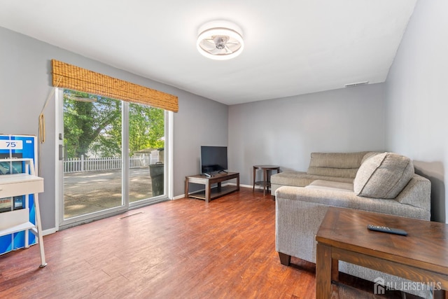 15 Creighton Cir, Old Bridge, NJ 08857 - living room featuring wood finished floors and baseboards