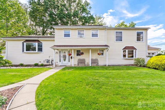 15 Creighton Cir, Old Bridge, NJ 08857 - view of front of property featuring a front lawn and covered porch
