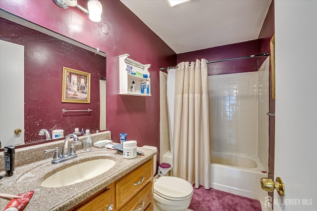 full bath with toilet, shower / bath combo with shower curtain, and vanity