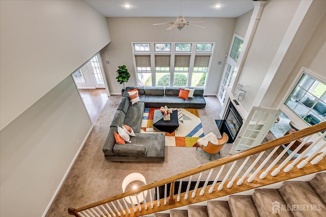 37 Equestrian Way, Monroe, NJ 08831 - living room with baseboards, plenty of natural light, a high ceiling, carpet, and recessed lighting