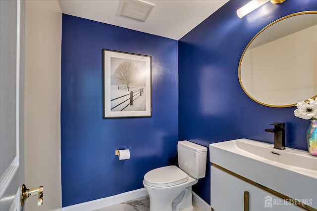 37 Equestrian Way, Monroe, NJ 08831 - bathroom featuring baseboards, toilet, marble look tiles, and vanity
