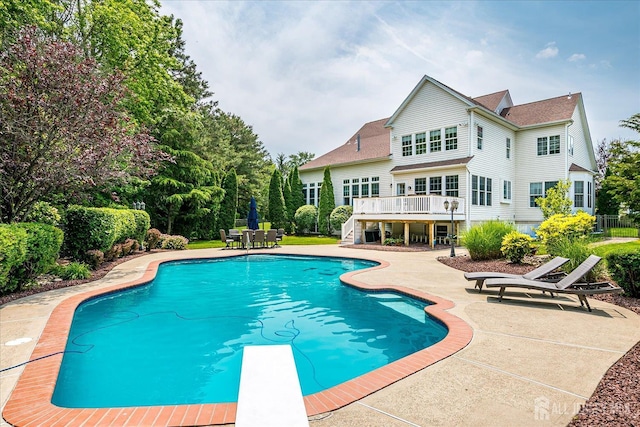 37 Equestrian Way, Monroe, NJ 08831 - swimming pool featuring stairway, a deck, a patio, and a diving board