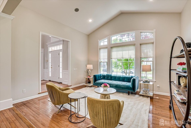 37 Equestrian Way, Monroe, NJ 08831 - living area featuring wood finished floors, vaulted ceiling, baseboards, and recessed lighting
