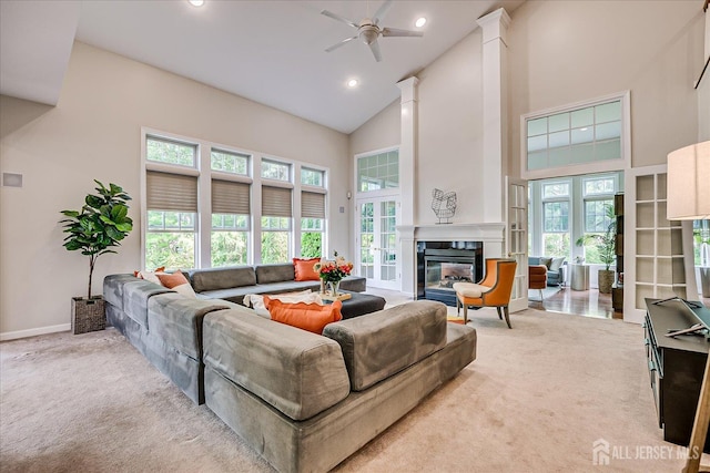 37 Equestrian Way, Monroe, NJ 08831 - carpeted living room with high vaulted ceiling, ceiling fan, a high end fireplace, recessed lighting, and baseboards