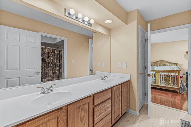 9 Narrow Brook Ct, Plainsboro, NJ 08536 - full bathroom with double vanity, tile patterned flooring, and baseboards