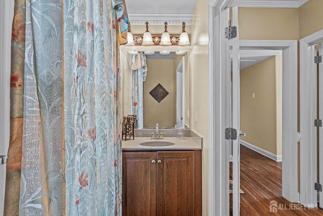9 Narrow Brook Ct, Plainsboro, NJ 08536 - full bath featuring wood finished floors, vanity, baseboards, and crown molding