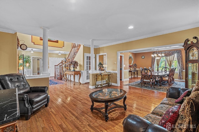 9 Narrow Brook Ct, Plainsboro, NJ 08536 - living area with ornate columns, wood finished floors, stairway, crown molding, and baseboards